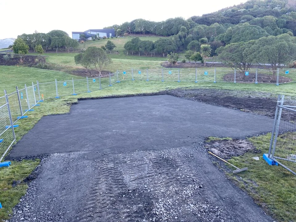 Level foundation preparation with compacted hardfill and formed access